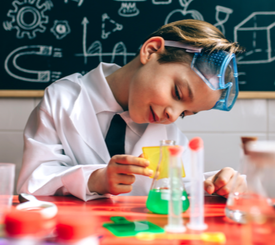 kid boy science coat goggles hands-on learning STEM
